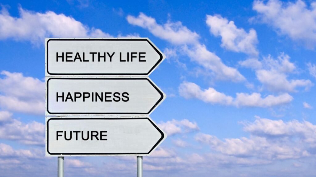 12 Signs You’re Searching for Meaning in Your Life and What to Do Next 3 Directional road sign pointing to healthy life, happiness, and future, representing signs You’re Searching for Meaning in Your Life
