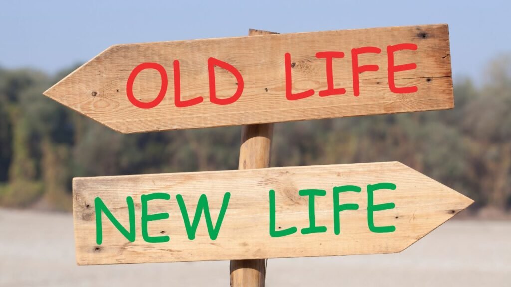 Wooden sign pointing to “Old Life” and “New Life,” symbolizing choices and the journey of how to find meaning in life