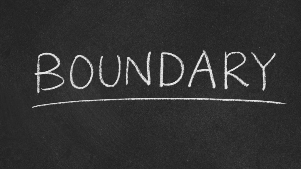 7 Clear Signs of Personal Growth Even if You Don’t Feel Like Growing 2 A black chalkboard with the word "BOUNDARY" written in large, white chalk letters and underlined. The image emphasizes the concept of boundaries, likely for educational or motivational purposes